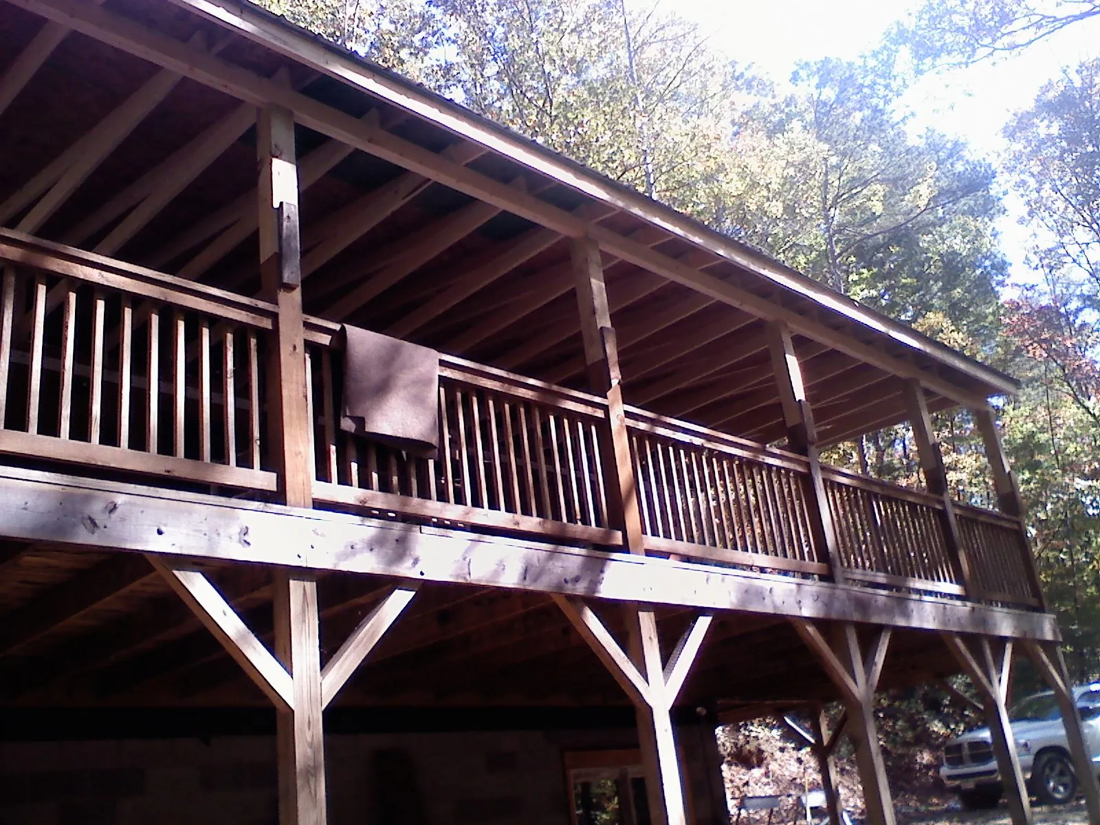 Timber framing under a new elevated porch and deck — Roof Leak Repair in Woodsfield by Roofing Brothers